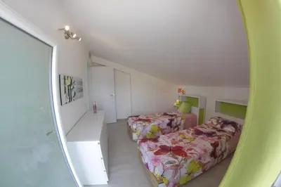 Letto o letti in una camera di Arricrietti