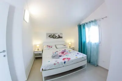 Letto o letti in una camera di Arricrietti