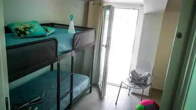 Letto o letti in una camera di Arricrietti