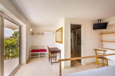 Letto o letti in una camera di Casa Del Mandorlo