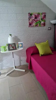 Letto o letti in una camera di A Casa Dei Miei