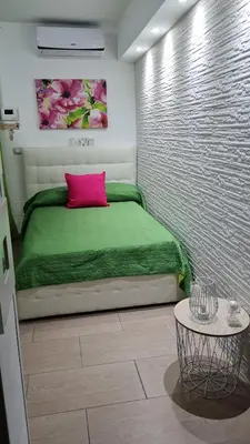 Letto o letti in una camera di A Casa Dei Miei
