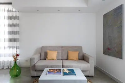 Area soggiorno di AM Suite with terrace by Wonderful Italy