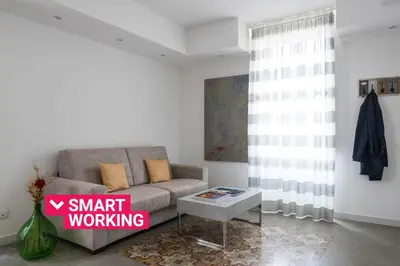 Area soggiorno di AM Suite with terrace by Wonderful Italy