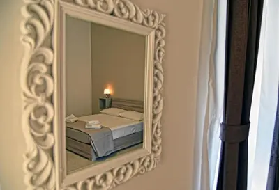 Letto o letti in una camera di casa mariavittoria