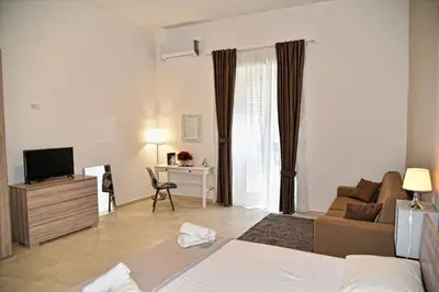 Letto o letti in una camera di casa mariavittoria