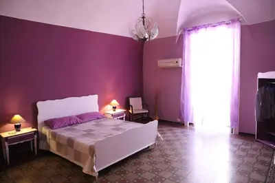 Letto o letti in una camera di la locanda del centro storico