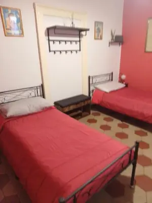 Letto o letti in una camera di la locanda del centro storico