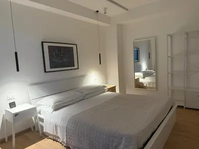 Letto o letti in una camera di Mood's Home