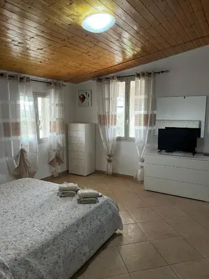 Letto o letti in una camera di Da Delfo