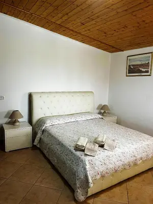 Letto o letti in una camera di Da Delfo