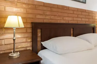 Letto o letti in una camera di Le Dimore del Mito - Atalanta