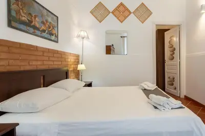 Letto o letti in una camera di Le Dimore del Mito - Atalanta