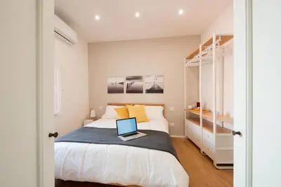 Letto o letti in una camera di Ortigia Suite - Giudecca