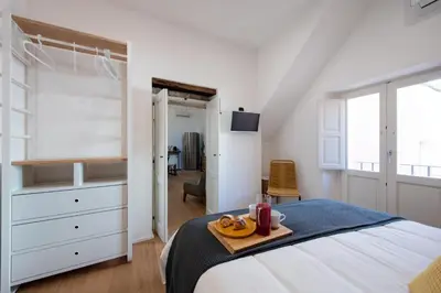 Letto o letti in una camera di Ortigia Suite - Giudecca
