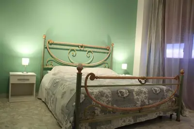 Letto o letti in una camera di Harmony Rooms