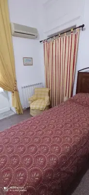 Letto o letti in una camera di Casa Cristina
