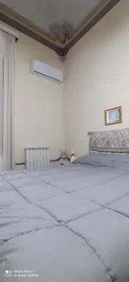Letto o letti in una camera di Casa Cristina