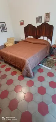 Letto o letti in una camera di Casa Cristina