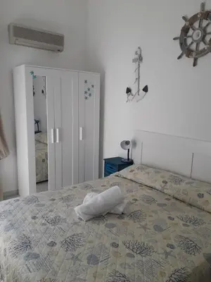 Letto o letti in una camera di Casa Barbara