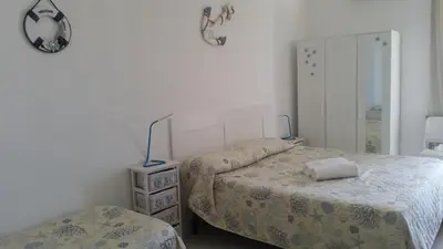 Letto o letti in una camera di Casa Barbara