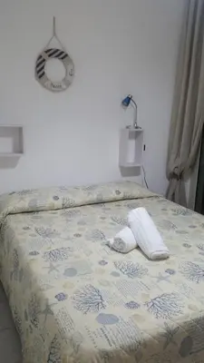 Letto o letti in una camera di Casa Barbara