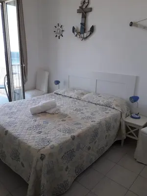 Letto o letti in una camera di Casa Barbara