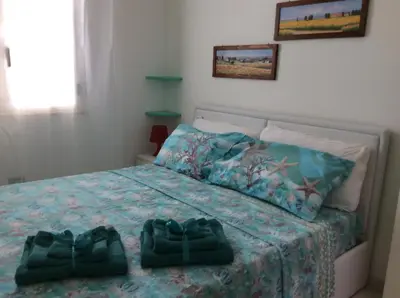 Letto o letti in una camera di Villa Vincenza