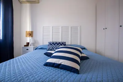 Letto o letti in una camera di Villa Ammari