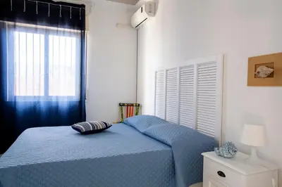 Letto o letti in una camera di Villa Ammari
