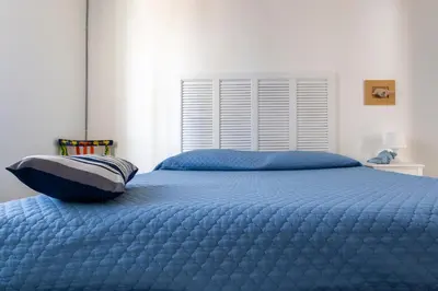 Letto o letti in una camera di Villa Ammari