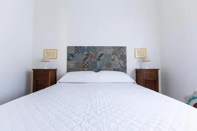 Letto o letti in una camera di Villa Ammari