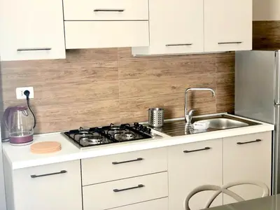 Cucina o angolo cottura di Nettuno Suite