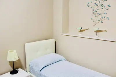 Letto o letti in una camera di Nettuno Suite