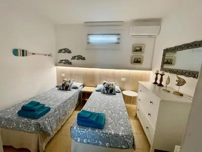Letto o letti in una camera di Casamare Lido di Noto