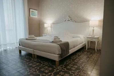 Letto o letti in una camera di La Casa di Alma Luxury rooms