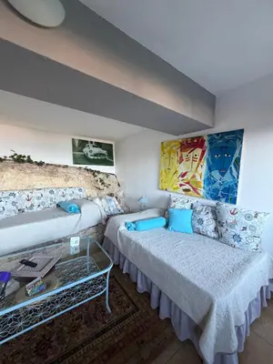 Letto o letti in una camera di Una Finestra sul Mare