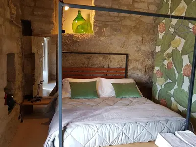 Letto o letti in una camera di Casa Santa Maria - Fichi d'india