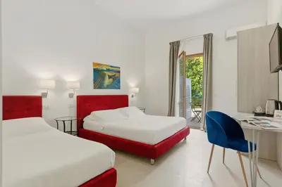 Letto o letti in una camera di Villa Landolina