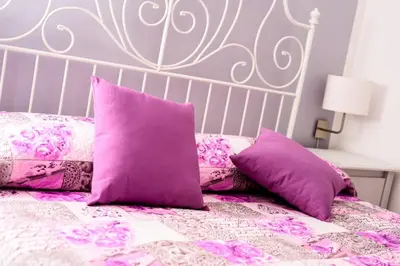 Letto o letti in una camera di La Fonte Di Ortigia