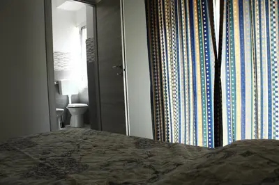 Letto o letti in una camera di Il Barocco