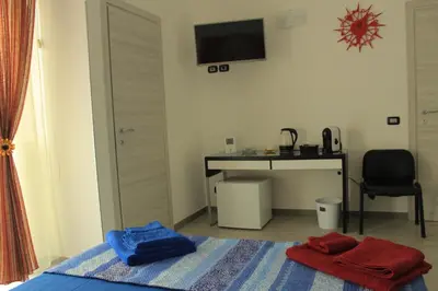 Letto o letti in una camera di Il Barocco