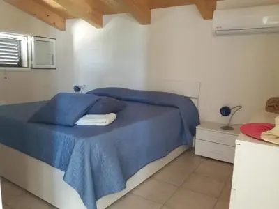 Letto o letti in una camera di Appartamento Acacia