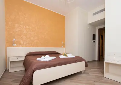 Letto o letti in una camera di B&B Vista Santuario