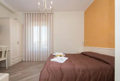 Letto o letti in una camera di B&B Vista Santuario