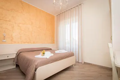 Letto o letti in una camera di B&B Vista Santuario