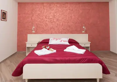 Letto o letti in una camera di B&B Vista Santuario