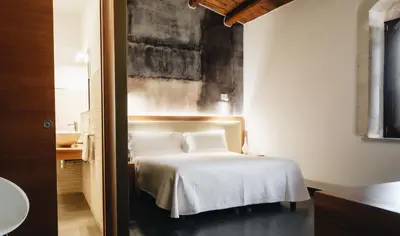 Letto o letti in una camera di Giardino Sul Duomo