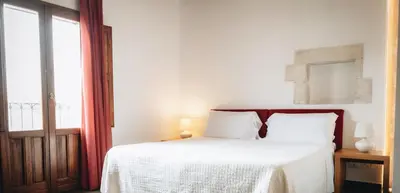 Letto o letti in una camera di Giardino Sul Duomo