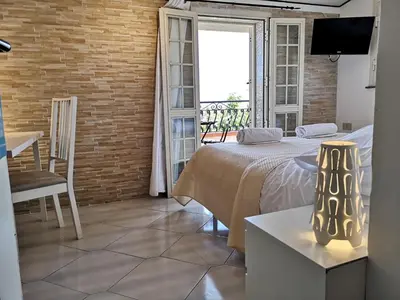 Letto o letti in una camera di Villa Ambra B&B